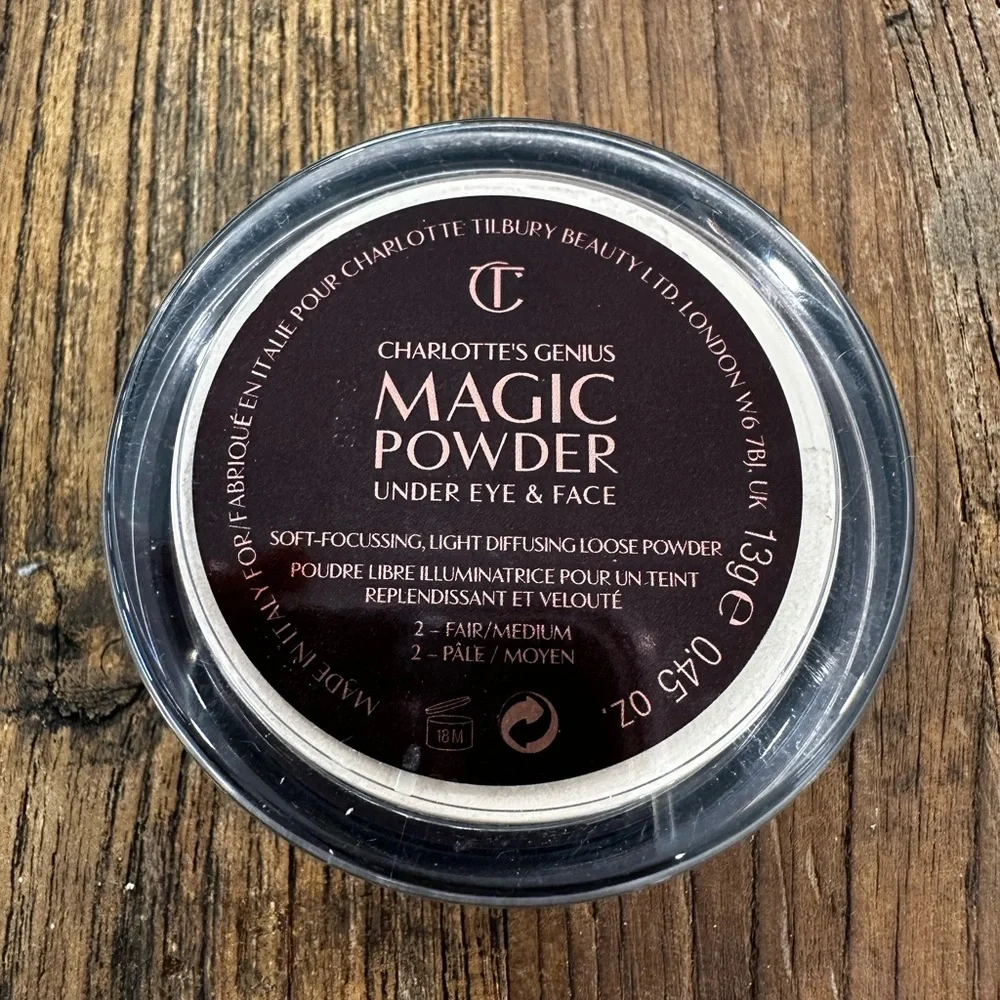 Charlotte Tilbury Magic Powder - Deep Brown Lid with Pale Pink Text